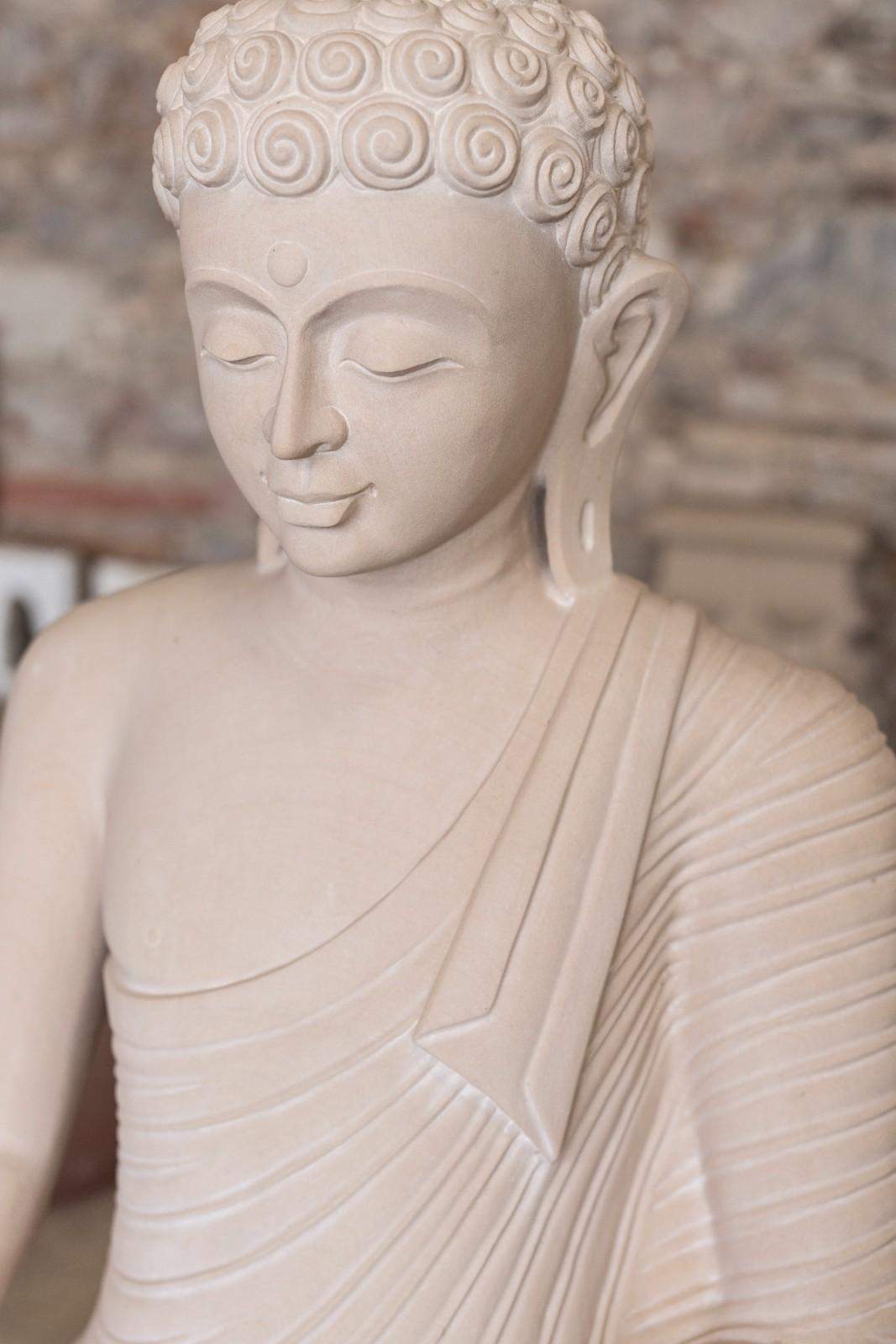 Pink Stone Buddha Sculpture